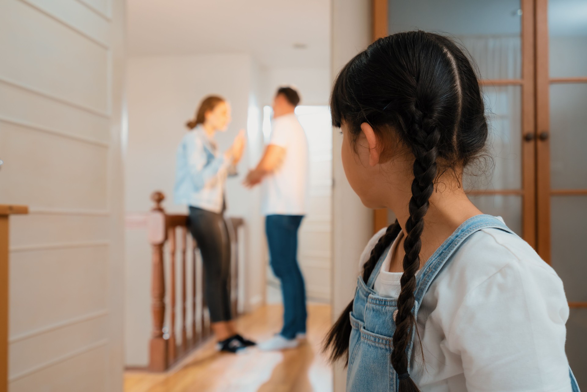 Stressed and unhappy young girl hide from domestic violence at home. Synchronos